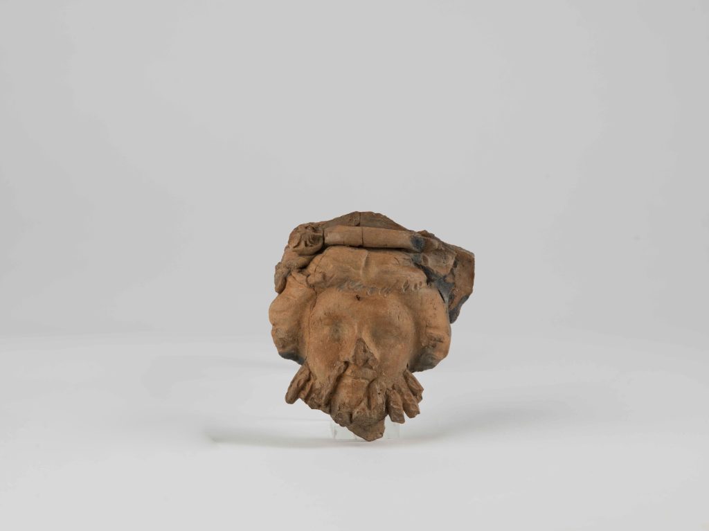 Head of a terracotta figurine of Dionysus