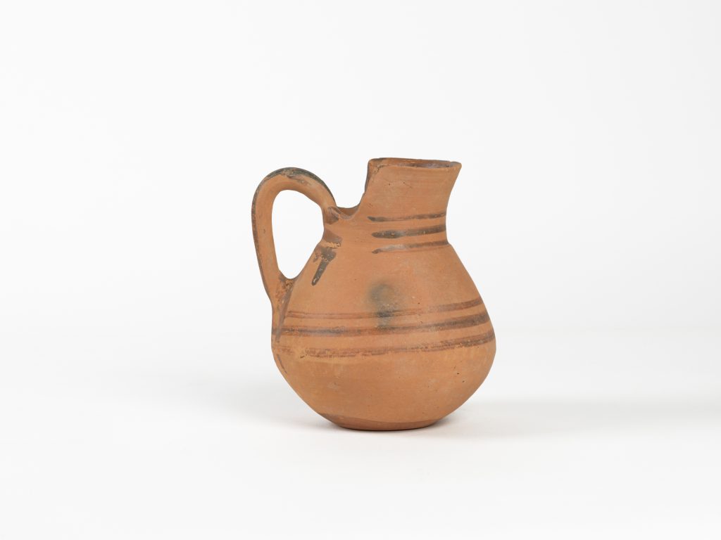 Jug with a cut-away neck