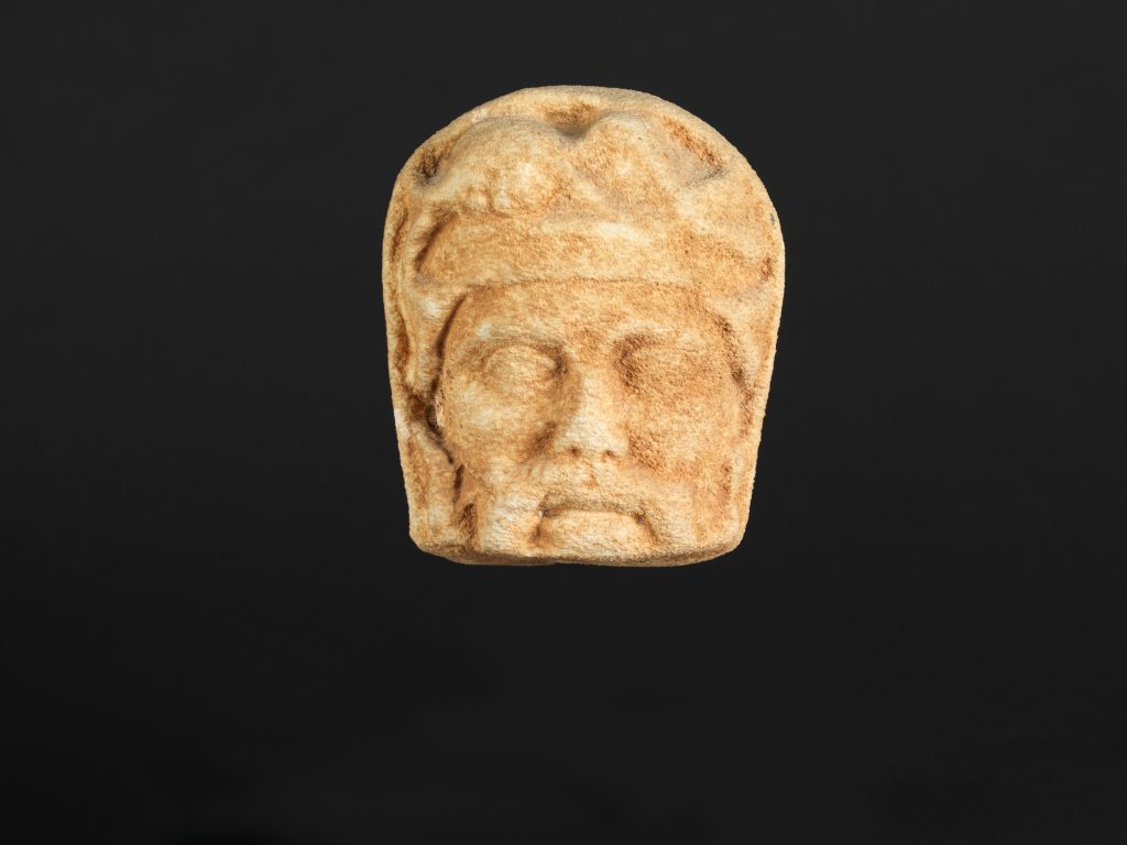 Marble head of a moustachioed man