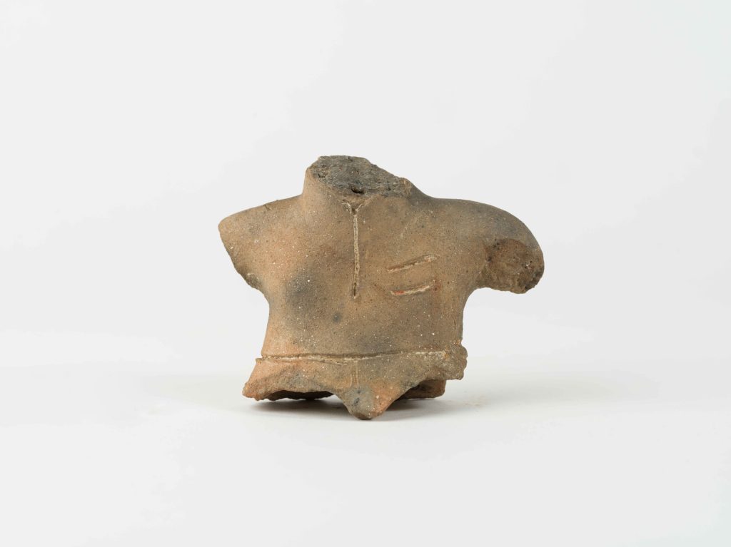 Fragment of a female figurine